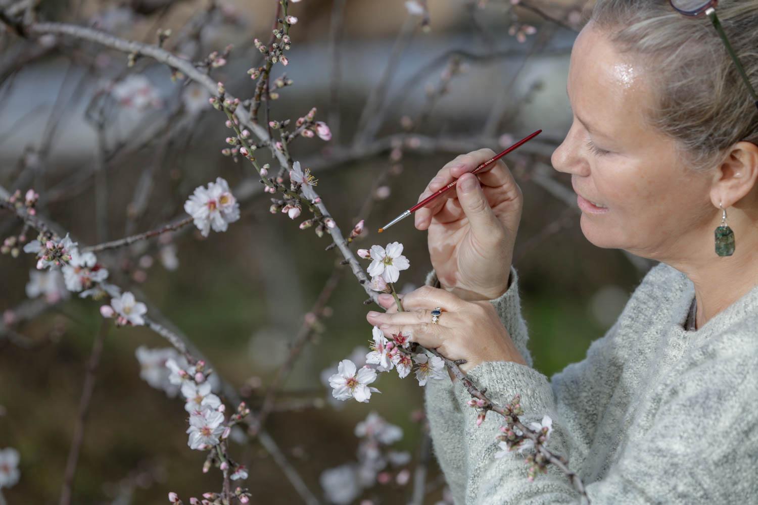 image of michelle wirthensohn with almond tree
