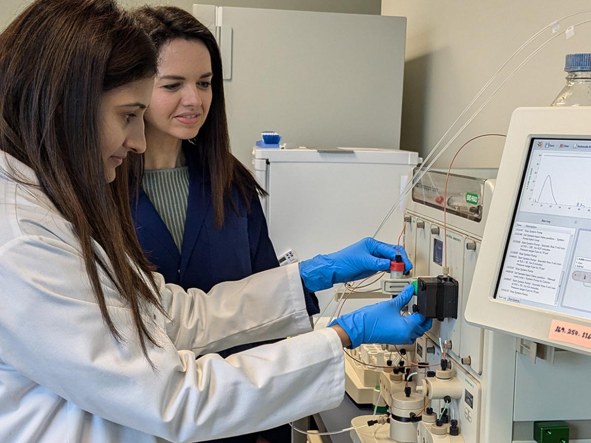 Two women in a science lab
