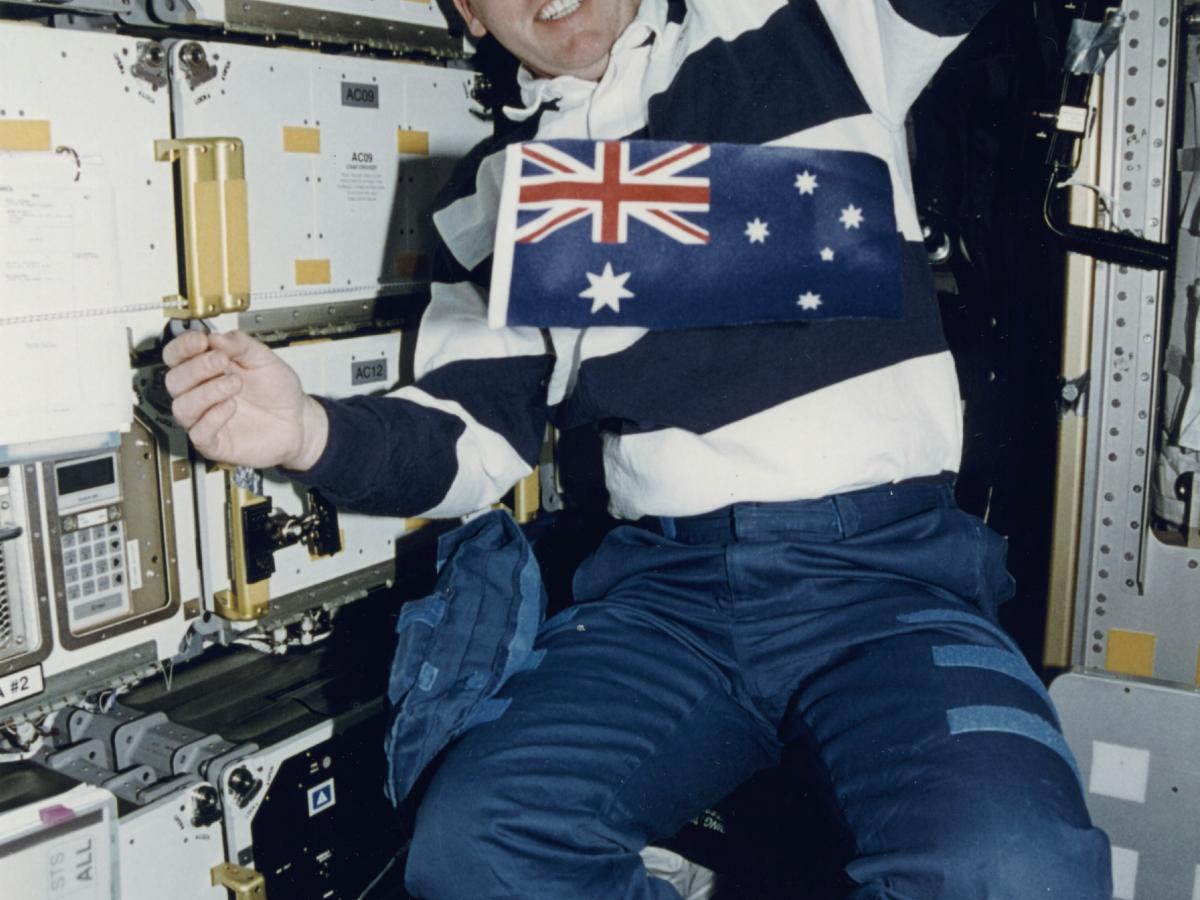Andy Thomas in space with the Australian flag
