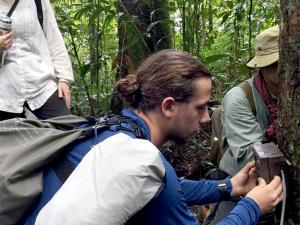 Ben D’Antonio and Sarah Heinrich from the School of Biological Sciences checking wildlife camera traps in the Cardamom Mountains, Cambodia