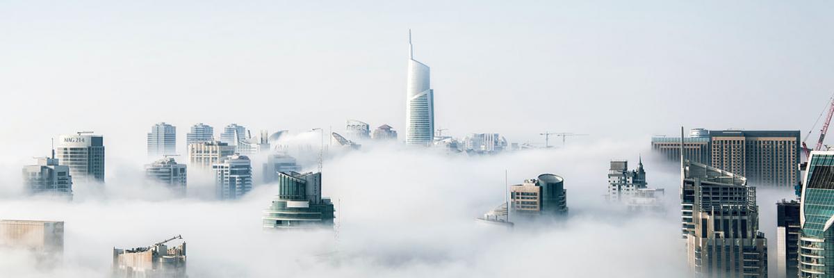 A city scape covered in fog