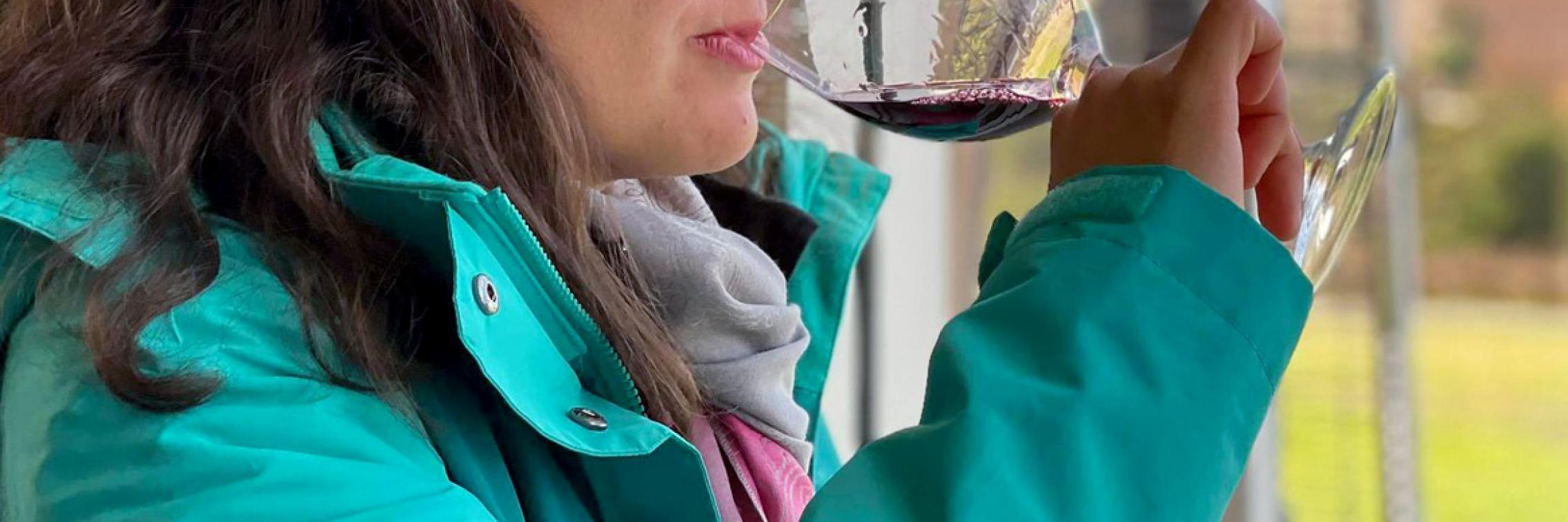 Natalia Caliani drinking wine in the Clare Valley