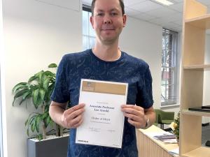 Mid-Career Research Excellence Award - Associate Professor Lee Arnold - Order of Merit