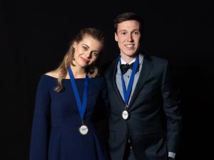 Award winners Amber Smith and Anthony Cox with their AWA medals