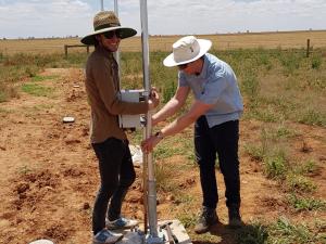 image of a man and a heliostat
