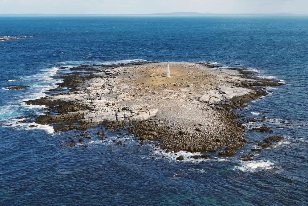 Low-lying rock islands and outcrops make important breeding sites for Australian sea lions but many are threatened by sea-level rise. J. Hodgson