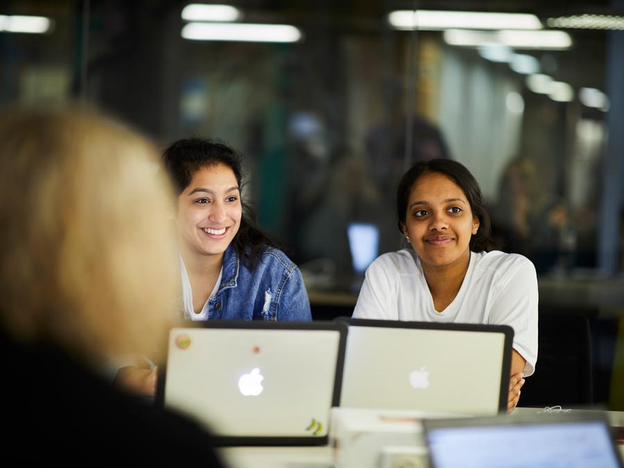 Students sitting around computers