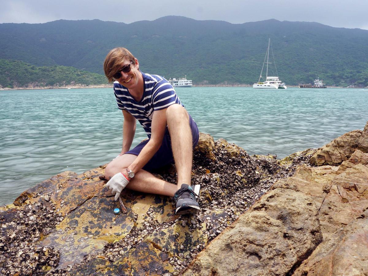 Dr Dominic McAfee working on intertidal oysters