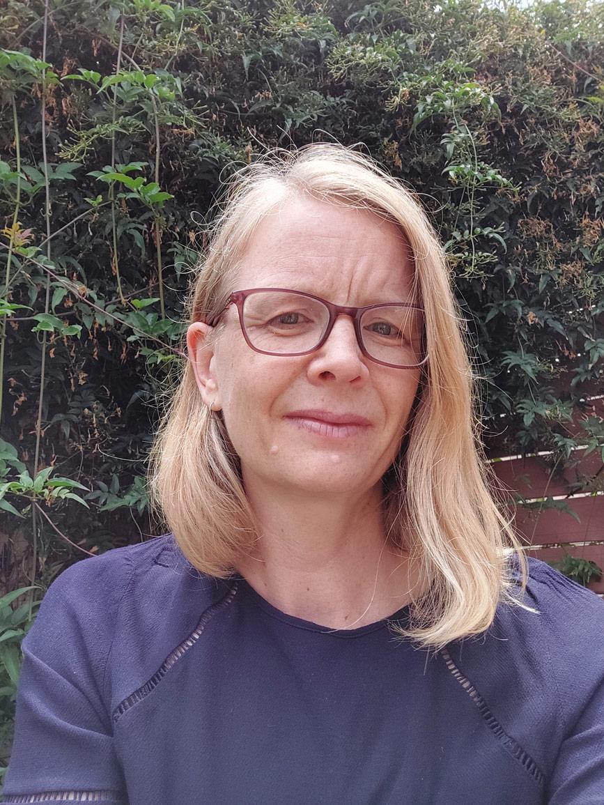 photo of a blond woman outside