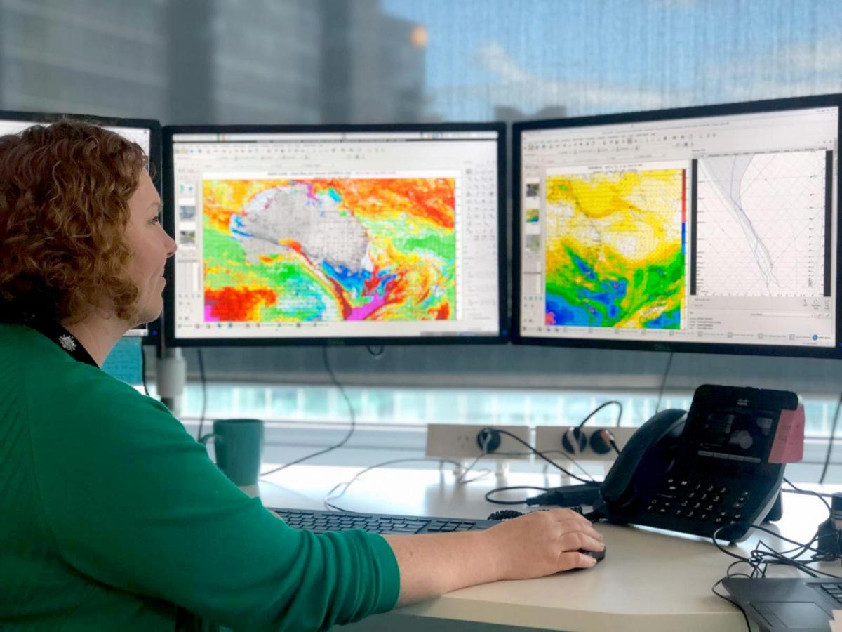 Phoebe De Wilt looking at weather patterns