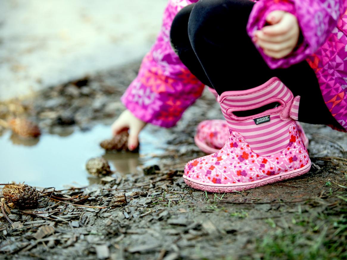 Child playing in mud