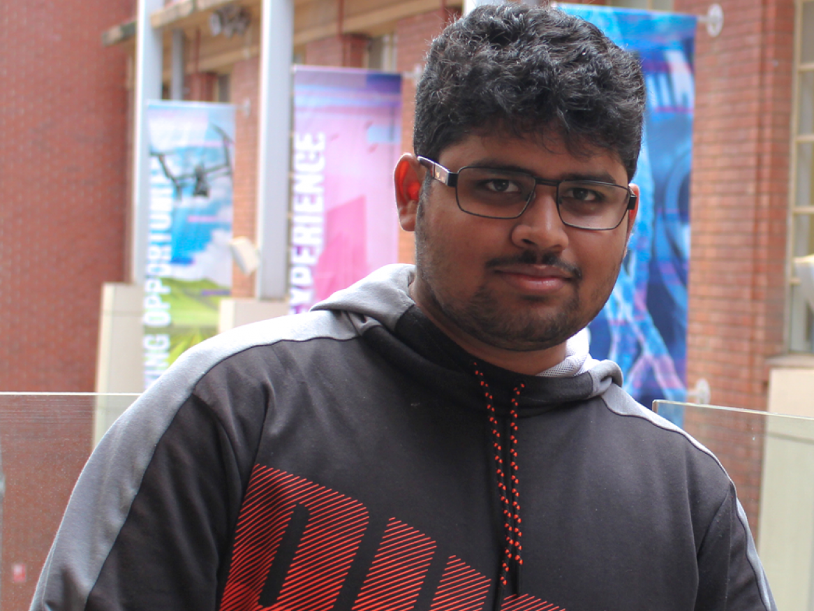 image of dinkar kashyap engineering student in ingkarni wardli atrium