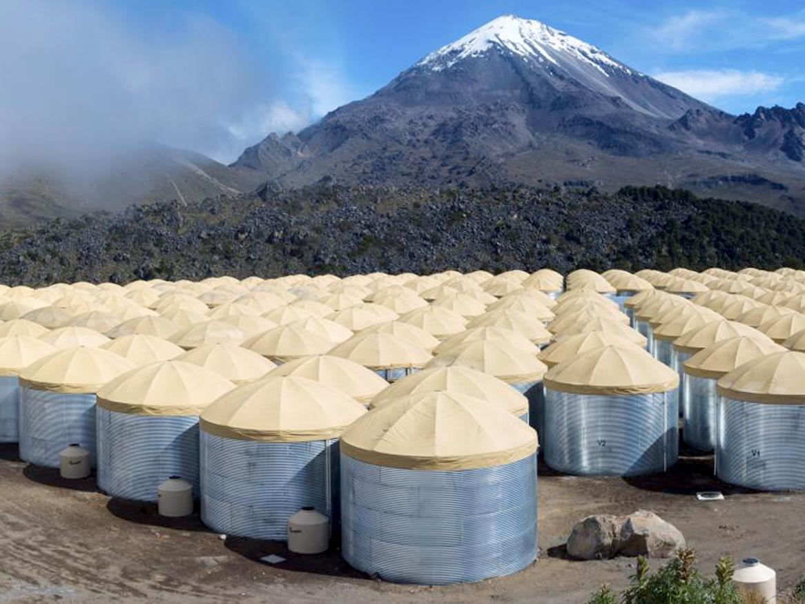 The High-Altitude Water Cherenkov Gamma-Ray Observatory on the slope of the Mexican Sierra Negra volcano. (Source: HAWC Observatory, J. Goodman)