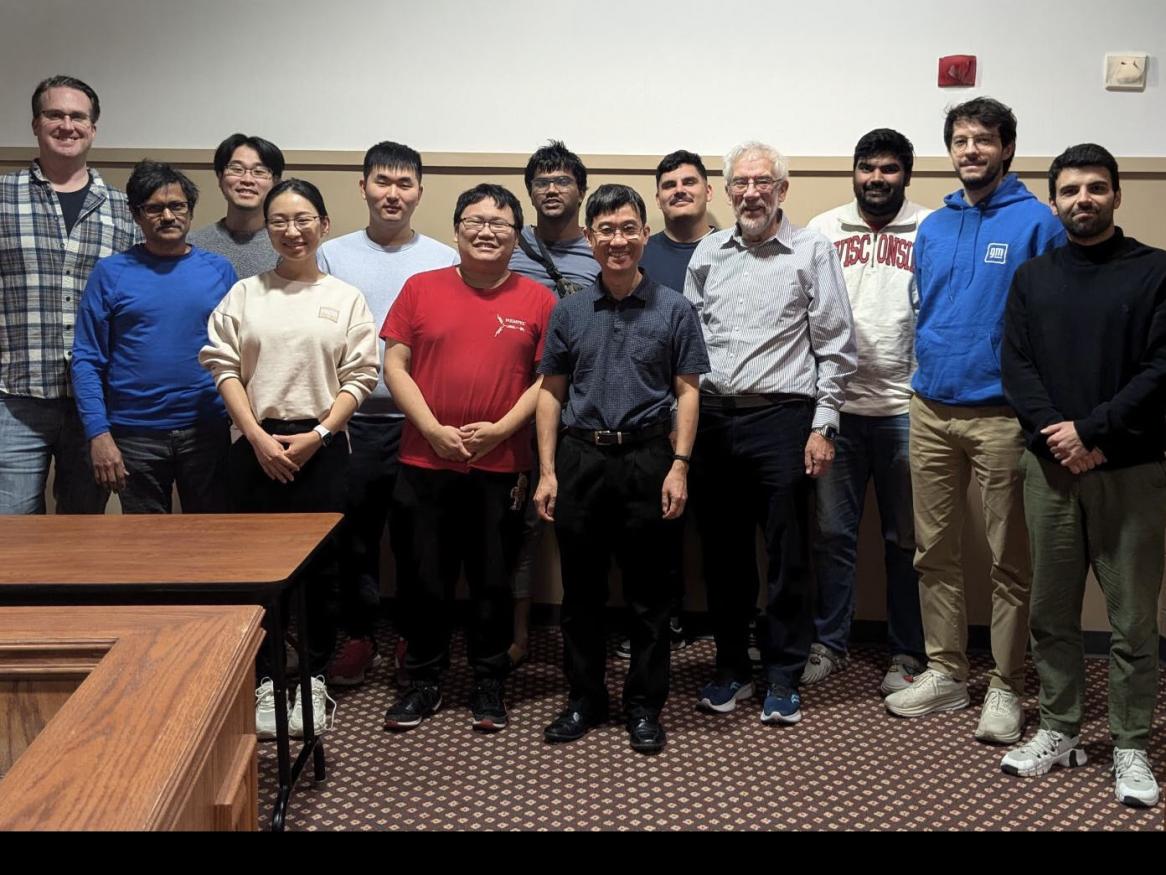 Associate Professor Wen Soong (centre) with University of Wisconsin-Madison power engineering staff and students